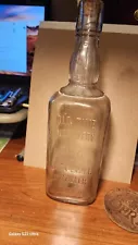 1895 A one quart Jack Daniels whiskey bottle “OLD TIME Distillery 7