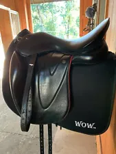 WOW Dressage Saddle for sale, 17in deep seat, black leather with red edge