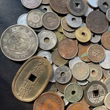 More than 100 old coins, 35 or more types, all together.