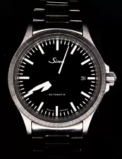 Sinn Spezialuhren 556 | Date - Black dial | Papers & Bracelets