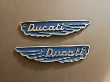 1971-1975 OEM Ducati 250/350/450 Scrambler PAIR Gas Fuel Tank Badges Used