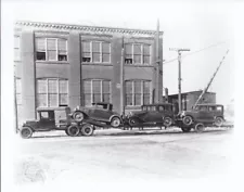 1929 Ford ? doolie trailer truck hauling 3 used cars photo