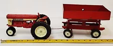 M-307 VINTAGE ERTL INTERNATIONAL HARVESTER RED TRACTOR WITH GRAVITY WAGON!