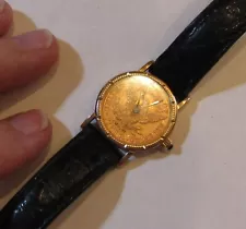 Corum 18K gold watch made to look like 5 dollar 1881 gold coin, runs for a while