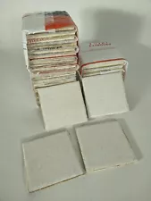 Boxed Lot of 36 cream with black speckled tiles from late 40s house