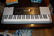 Casio Electronic Sampling Piano / Keyboard Model CTK-4200 w/Power Adapter