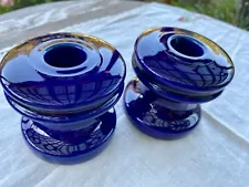 Vintage cobalt blue ceramic spool insulators