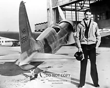 HOWARD HUGHES STANDING NEXT TO THE HUGHES H-1 RACER - 8X10 PHOTO (MW440)