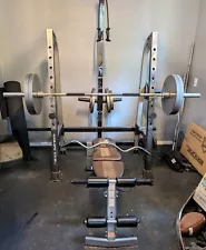 Home gym, bench/squat rack, lat pull down, etc. Olympic bar. 340 lbs of weights