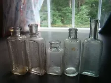 ANTIQUE 1890's FIVE PIECE EMBOSSED MEDICINE BOTTLE LOT