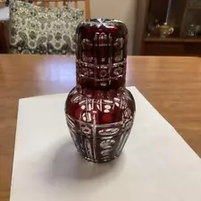 Red Glass Bottle With Engraved Pattern