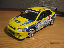 1/18 2002 MITSUBISHI LANCER EVO VII,IN YELLOW-"FAST & FURIOUS" ? ERTL , NO BOX