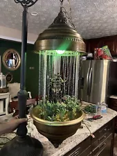 Custom-made Medusa mineral oil Rain Lamp.