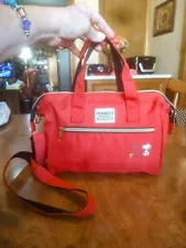 Red Snoopy canvas handbag/lunch bag. 9" x 7" x 3.5". Has wire tops