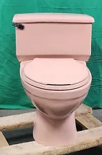 rose light pink Vintage Bathroom Toilet made by American Standard Artesian