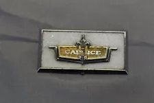 Original interior door panel emblem for 1975 Chevy Caprice