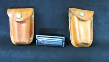 Winchester Model 88 .284 magazine and vintage Hunter leather pouches