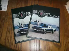 1984 Oldsmobile Firenza Delta 88 98 Toronado Cutlass Sales Brochure - 2 for 1