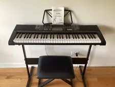 Electronic Keyboard Piano Organ with stool.