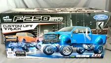 NEW CEN Ford F250 SD 4WD Solid Axle Custom Lift Truck RTR, Pre-lit, Daytona Blue