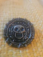 Disney 1.5" Metal Silver Toned Coin Medallion Pirates of Caribbean Aztec Skull