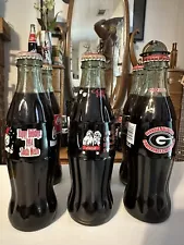 This Sale Is For 8 Different Very Sought After 8oz Coca Cola Bottles