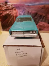 1966 Mercury Parklane. 1/25 scale plastic AMT friction promo model in Turquoise