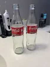 This Sale Is For (1) Solid Crystal and Very Heavy Coca Cola Bottle.