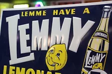 LEMME HAVE A LEMMY LEMONADE EMBOSSED METAL SIGN BOTTLE GENERAL STORE GAS OIL 66