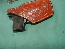 Fancy tooled leather EL PASO holster for A .25 CAL AUTO