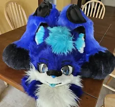 Blue kemono wolf fursuit head and feet paws