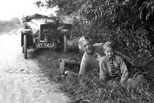 Cxx-8 Vintage Jowett Open Topped Motor Car with People. Photo