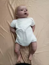 Reborn baby doll approximately 19" marked "Evalina Wasnjuk"?