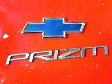 1998 2002 Chevrolet Chevy Geo Prizm emblem badge script OEM Genuine Original