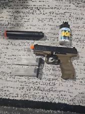 Airsoft Pistol With 1 Container With 400 BBs 2 Clips And A Supreser.