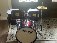 Used jr drum set. With hi hat cymbals and bass pedal