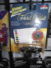 Johnny lightning 1/64 Trivial pursuit 1977 Pontiac trans am black NIB