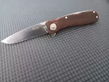 SOG Twitch 2 Assisted Lock Back, Pocket Knife. Rosewood some scratches blade