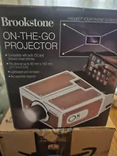 Brookstone On-the-go Projector for use with both iOS and Android Smart Phones 