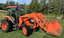 Good condition Kubota M7040DTC with loader