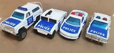 Ford LTD, Humvee, Chevy Blazer & Camaro Police -White/Blue by Matchbox 1996