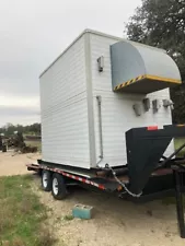 generac generator with housing unit mounted on a 20' gooseneck trailer