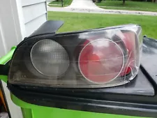 2002 Honda s2000 tail light Passanger Side OEM for parts or repair.