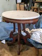 Victorian Carved Walnut and Marble Parlor Table.