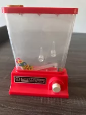 Vintage Tomy Waterful Hand Held Ring Toss Water Game!