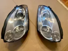 2006 - 2007 Infiniti G35 Coupe OEM Headlights Left & Right (Headlamp Assembly)