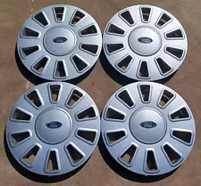 Ford Crown Victoria hubcap set 2006-2011, fits 17" wheel, pn 7W73 1130 AE 7050