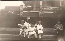 RPPC Family Photo Plank Sidewalk Child on Velocipede Home for Sale Postcard U6