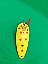 vintage fishing lure Old brightly colored weedless dare devil spoon for pike.