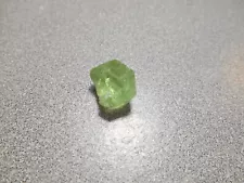 Peridot faceting rough. new pastel color. clean. 10.3 cts. Pakistan.